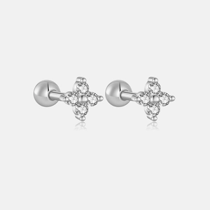 Macro shot of silver S925 clover stud earrings with white zircons and screw ball backs