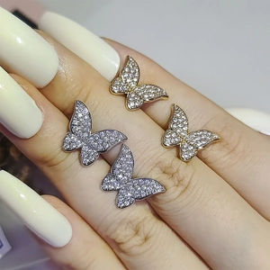Sparkling butterfly stud earrings with white zircons in gold and silver finish