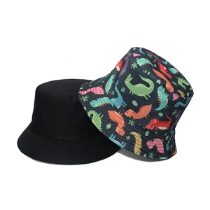 Reversible bucket hat for adults featuring cute colorful dinosaur prints and solid black
