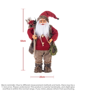 Detailed view of 60cm standing Santa Claus figurine with red sweater and pine cones