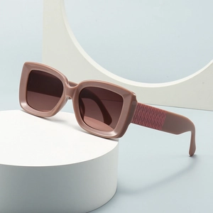 Modern square plaid patterned sunglasses in rose pink with vintage frame and dark lenses