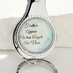 Silver keychain with 'Feathers Appear When Angels Are Near' pendant on white background