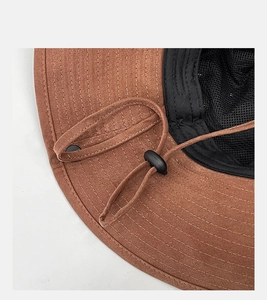 Detail of western sun hat with breathable mesh lining and adjustable windproof cord
