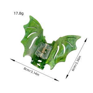 Green marbled acetate butterfly hair claw clip with glitter detail and metal spring