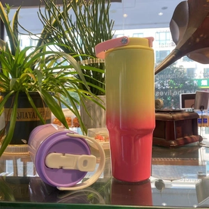 Dual-purpose 30oz insulated tumbler set with gradient colors and portable handle