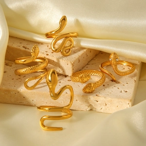 Detailed view of 18K gold plated snake rings set featuring scale texture and crystal accents