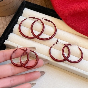 Vintage round Ancora red hoop earrings for women shown in a premium beige jewelry box