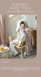 Detail of pink fleece cape with plush rabbit ears and soft lamb wool lining