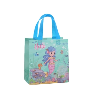 Mermaid themed non-woven gift bag with blue handles and mint green ocean print