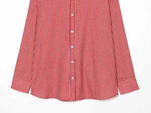 Detailed view of red and white gingham poplin shirt with white round buttons