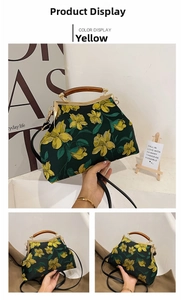 Detailed embroidery on vintage green jacquard bag with golden flower patterns