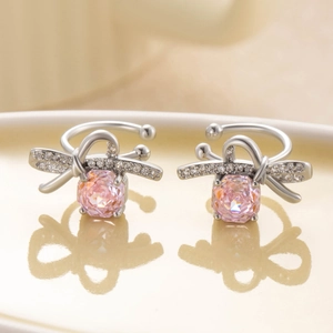 U-shaped bow ear clips with pink millennium rose cut zircon and silver accents