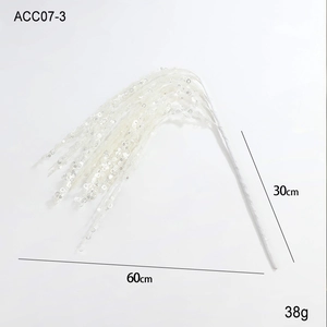 Detail showing 60cm white sequined Christmas branch with glittered tassel accents