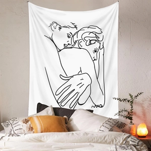 Detail shot of minimalist line art tapestry depicting a silhouette embrace on a wall