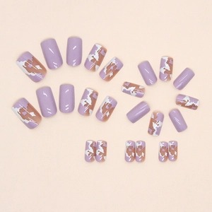 Long lavender cow print press-on nails with glossy finish in 24-piece manicure set
