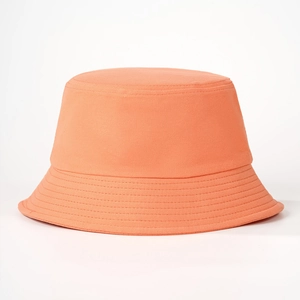 Detail of orange cotton bucket hat showing twill texture and multi-row stitched brim
