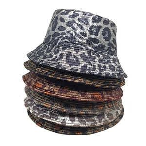 Detailed stack of various leopard print bucket hats in gray and brown textured fabrics