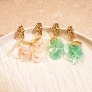 Elegant geometric shell drop earrings in beige and mint green with gold-tone accents