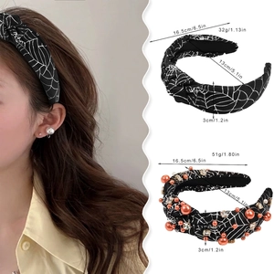 Halloween spider web headband with decorative pearls and rhinestones on wide fabric base