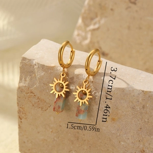 Detail showing gold sun charms and natural stone earrings with dimension specs