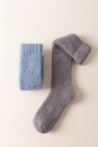 Detailed texture of thick coral fleece knee-high socks in dark grey and light blue