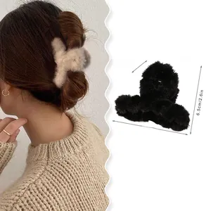 Detailed plush hair claw clip measurements showing size 9x6.5cm and soft faux fur texture