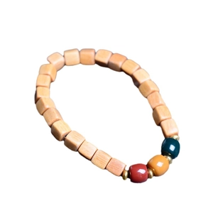 Ethnic style sandalwood beaded bracelet with natural wood texture and colorful glaze beads