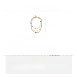 Detailed view of triple-layered gold necklaces with evil eye pendant and blue beads