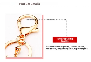 Close-up of polished gold plated lobster clasp and metal ring with mirror finish texture