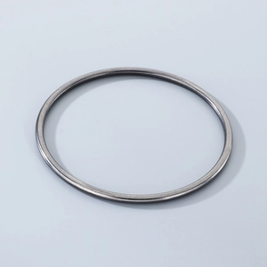 Detail view of 3mm gunmetal grey matte titanium steel bangle with seamless design