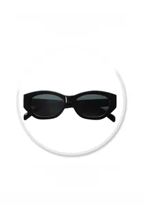 Detail view of vintage cat-eye sunglasses with retro black frame and UV protection lens