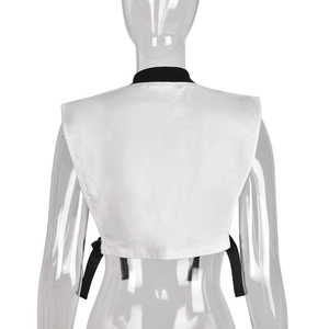 Rear view of white cropped vest with black contrast piping on transparent mannequin