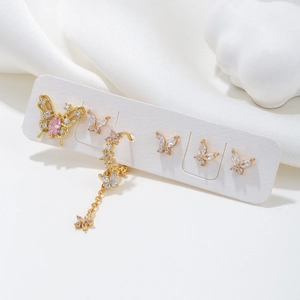 Elegant gold butterfly tassel earring set with pink and white zircon on white silk