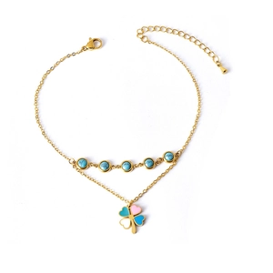 Double-layered gold anklet with turquoise beads and colorful enamel clover pendant