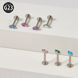 Detailed set of marquise-cut opal labret studs made of solid G23 titanium alloy