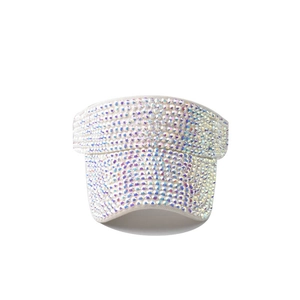 Detailed close-up of a white sun visor hat decorated with shiny AB aurora rhinestones