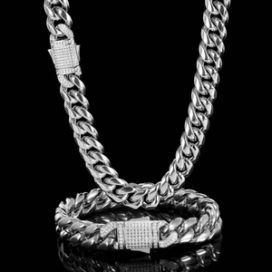 Polished silver Cuban link necklace and bracelet set with iced-out pave rhinestone clasps