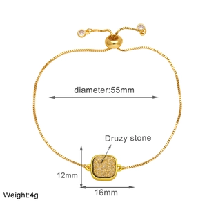 Detail view of gold-plated slider bracelet with 16mm square druzy stone and adjustable chain