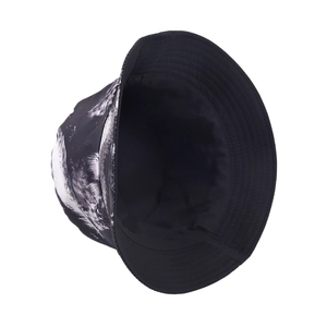 Detail view of black bucket hat with artistic ink wolf print and durable lining