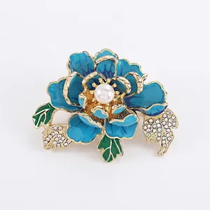 Elegant peony flower brooch with blue enamel petals and a large center pearl