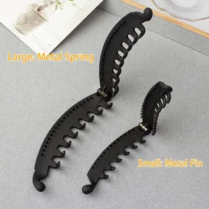 Elegant matte black banana hair clips in two sizes for women with durable metal springs