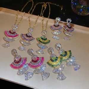 Luxury fan-shaped jewelry set with colorful gradient crystals and gold-plated chain