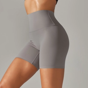 Close-up of high-waisted seamless dark gray yoga shorts with body-shaping fit