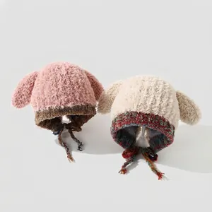 Gorros de peluche para niños con orejas de conejo en rosa y beige con lazos de punto