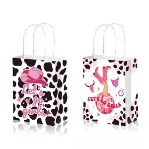 Detail of disco cowgirl gift bags with Let's Go Girls text and pink cowboy hat icons