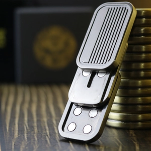 Macro shot of silver magnetic EDC slider toy showing internal magnets and metal texture