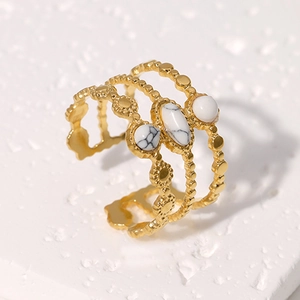 Vintage gold layered stainless steel open ring featuring white marble stones