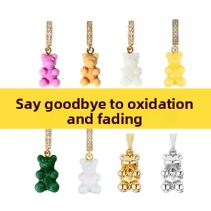 Set of eight colorful resin bear pendants with sparkling rhinestone encrusted metal clasps
