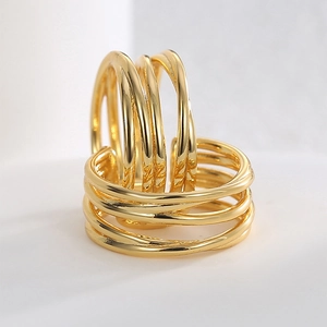 Minimalist gold-plated multi-layer coiled ring with contemporary geometric design