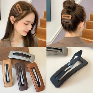 Detailed views of leather rectangular hollow hair clips and model styling in earth tones